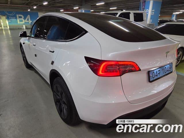 Tesla модель Y Long Range AWD, 2024 6