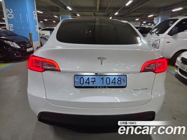 Tesla модель Y Long Range AWD, 2024 7