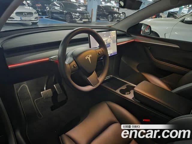 Tesla модель Y Long Range AWD, 2024 7