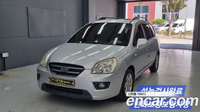 Kia 뉴카렌스 люксовая версия, 2009 1