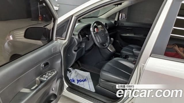 Kia 뉴카렌스 люксовая версия, 2009 10