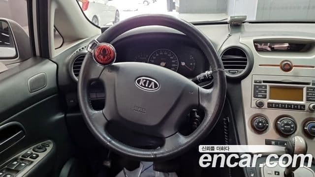 Kia 뉴카렌스 люксовая версия, 2009 12