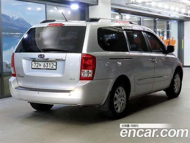 Kia Carnival R люксовая версия, 2012 4