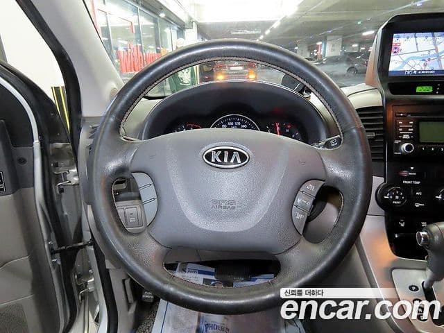 Kia Carnival R люксовая версия, 2012 8