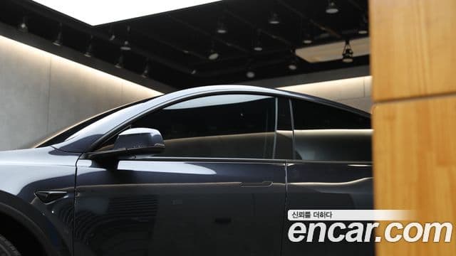 Tesla модель Y, 2025 4