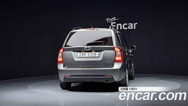 Kia 뉴카렌스 люксовая версия, 2009 4