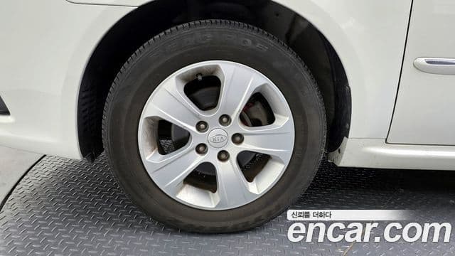 Kia 로체 이노베이션 топовая версия, 2009 все фото