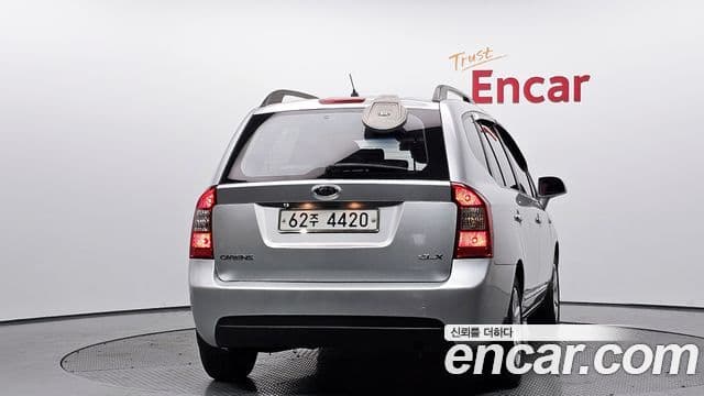 Kia 뉴카렌스 люксовая версия, 2009 4