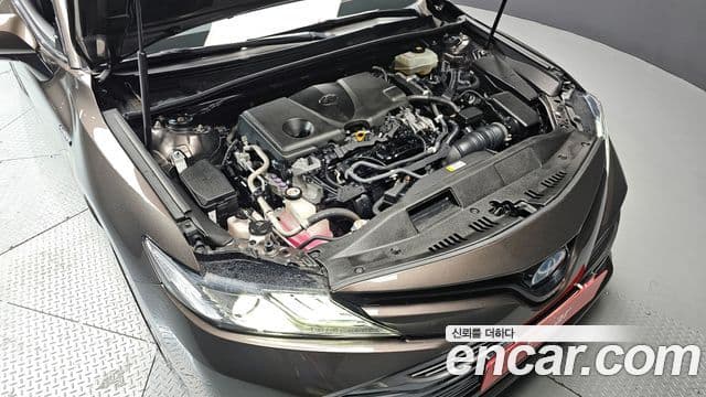 Toyota 캠리 (XV70) 2.5 XLE гибрид, 2019 6