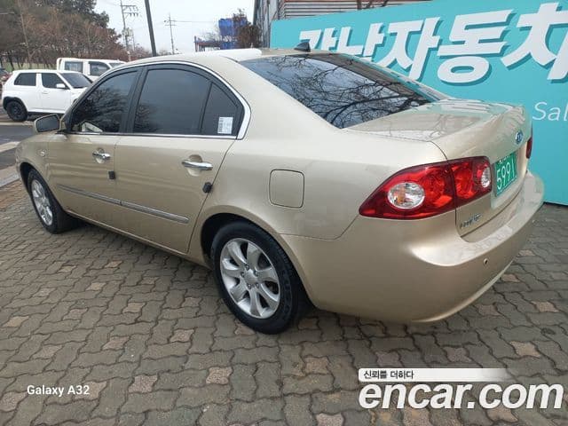 Kia 로체 Mozen люксовая версия, 2006 4