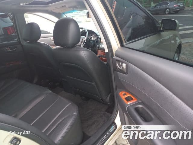 Kia 로체 Mozen люксовая версия, 2006 6