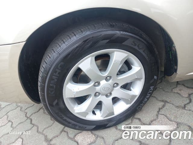 Kia 로체 Mozen люксовая версия, 2006 18