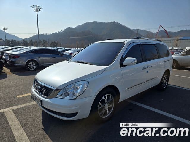 Kia Carnival R топовая версия, 2014 1