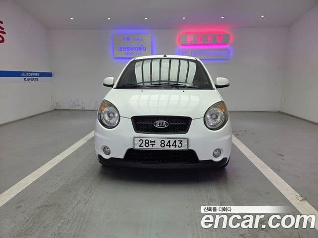 Kia 뉴모닝 люксовая версия Black Premium, 2010 1