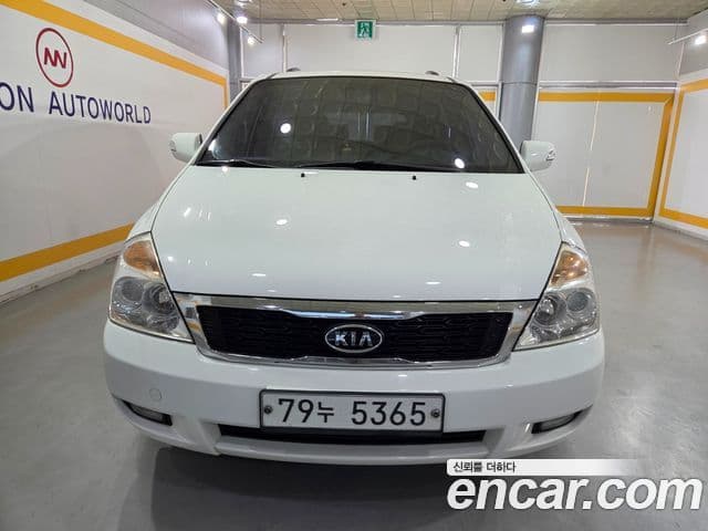Kia Carnival R топовая версия, 2012 1