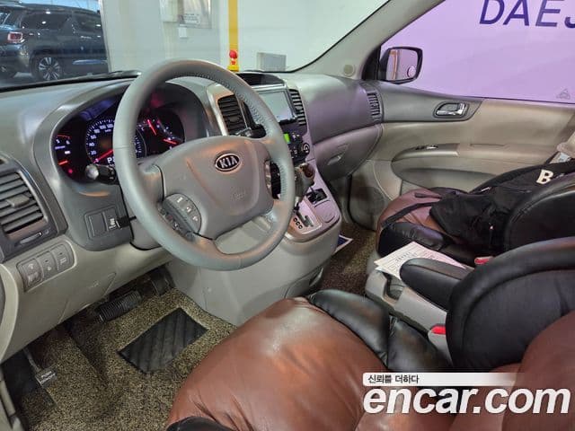 Kia Carnival R топовая версия, 2012 14
