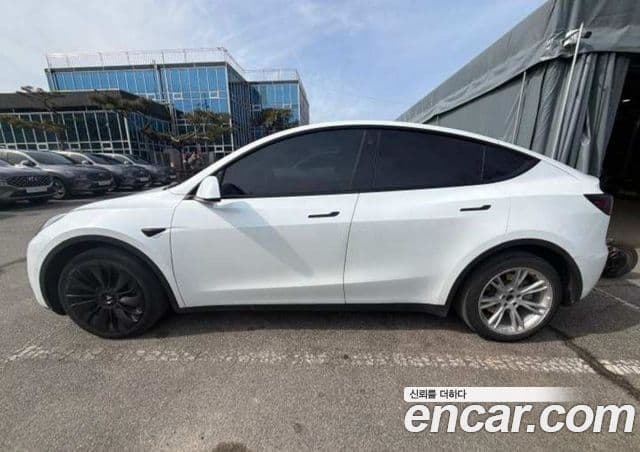 Tesla модель Y Long Range AWD, 2022 все фото