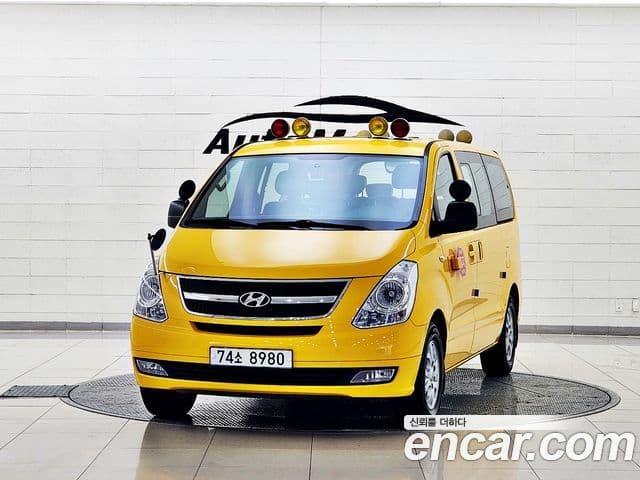 Hyundai Grand Starex детский перевозочный автомобиль, 2013 1
