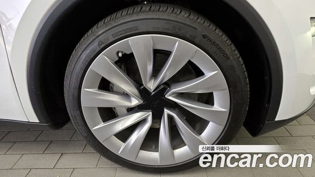 Tesla модель Y Long Range AWD, 2025 все фото