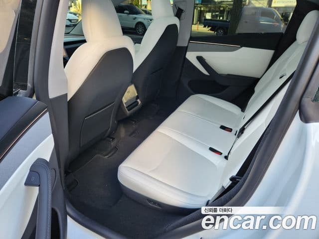 Tesla модель Y, 2025 15