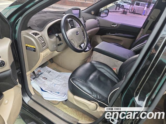 Kia Carnival R топовая версия, 2013 11