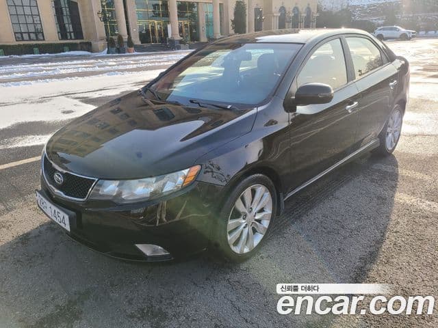 Kia Forte чёрный, 2010 1