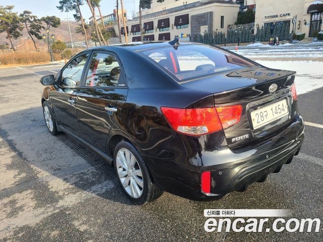 Kia Forte чёрный, 2010 2