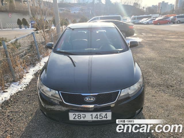 Kia Forte чёрный, 2010 3