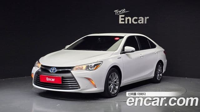 Toyota New 캠리 гибрид LE, 2016 1