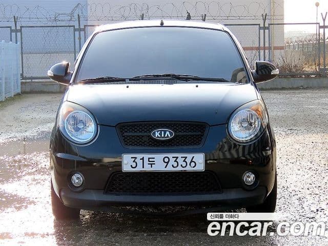 Kia 뉴모닝 люксовая версия Black Premium, 2009 1