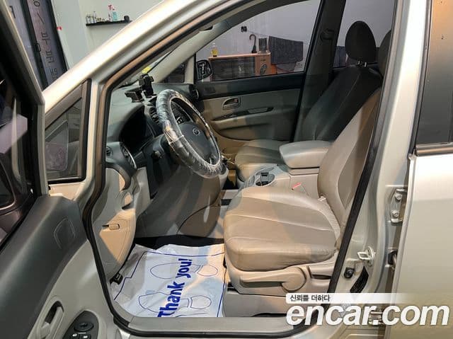 Kia 뉴카렌스 топовая версия, 2008 9