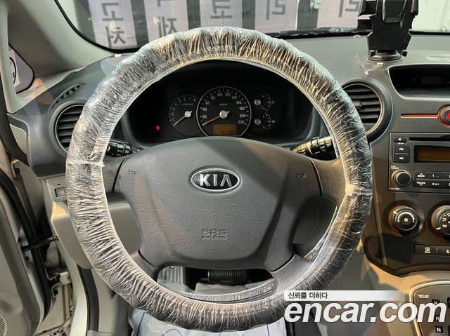 Kia 뉴카렌스 топовая версия, 2008 13