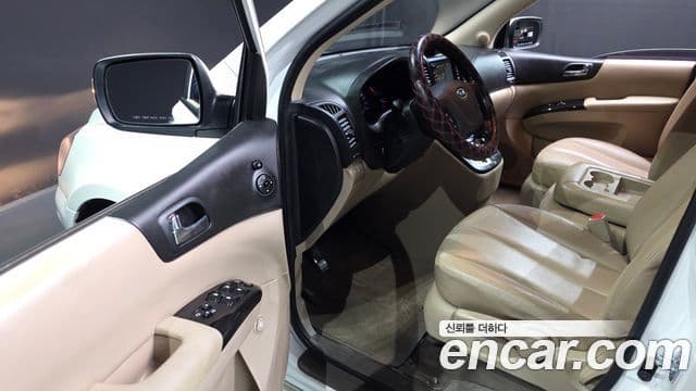 Kia Carnival R топовая версия, 2012 11