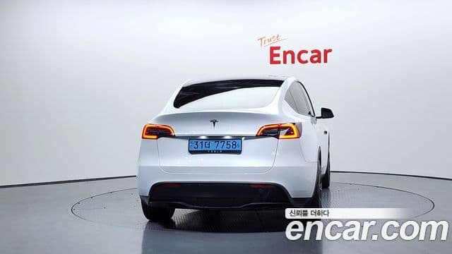 Tesla модель Y, 2024 4