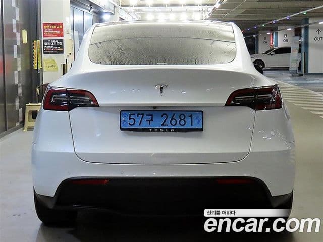 Tesla модель Y Standard Range RWD, 2021 все фото