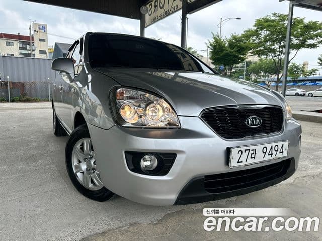 Kia 뉴카렌스 люксовая версия, 2011 1