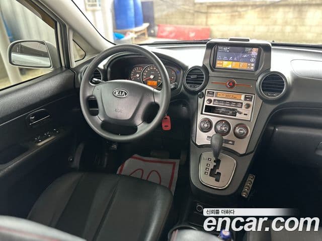 Kia 뉴카렌스 люксовая версия, 2011 12