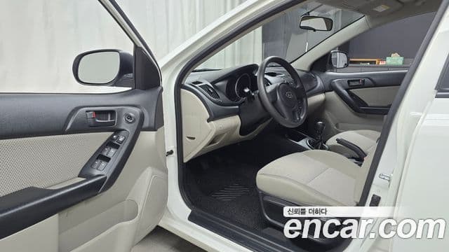 Kia Forte люксовая версия, 2010 11