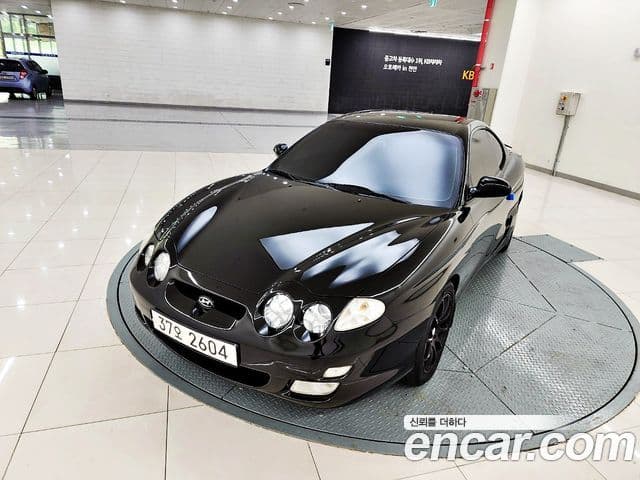 Hyundai 티뷰론 люксовая версия, 2000 6