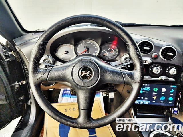 Hyundai 티뷰론 люксовая версия, 2000 11