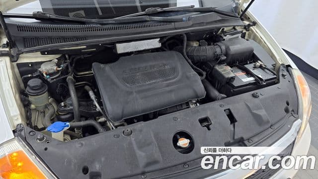 Kia Carnival R Premium, 2012 6