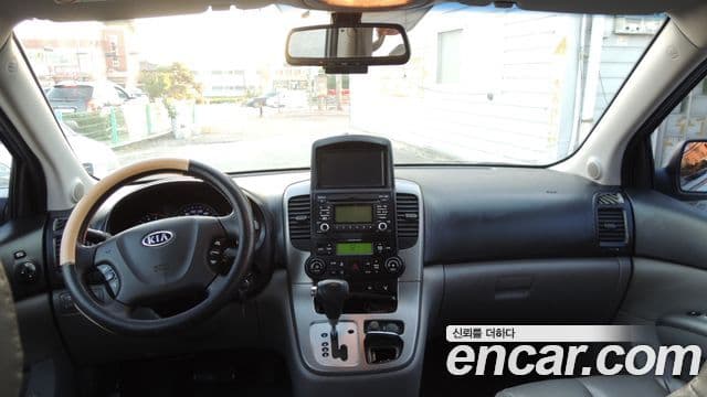 Kia Carnival R топовая версия, 2012 7