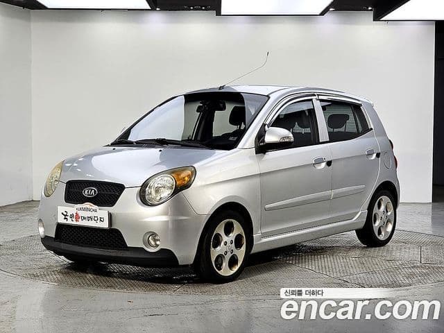 Kia 뉴모닝 люксовая версия Black Premium, 2009 1