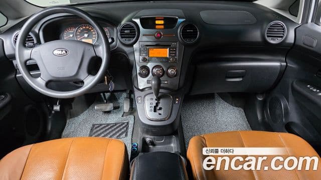 Kia 뉴카렌스 топовая версия Family, 2012 7