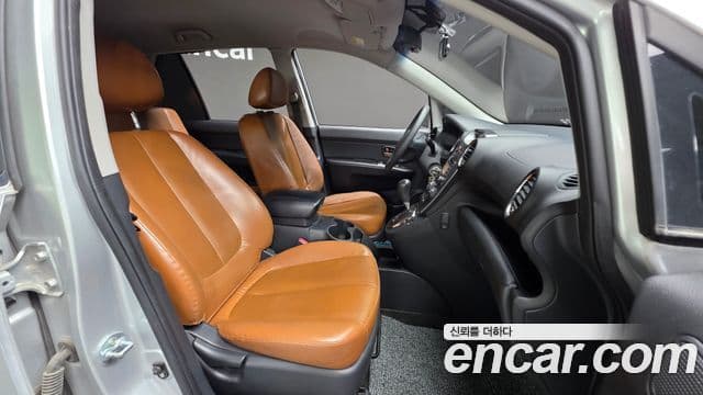 Kia 뉴카렌스 топовая версия Family, 2012 10