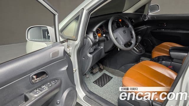 Kia 뉴카렌스 топовая версия Family, 2012 11