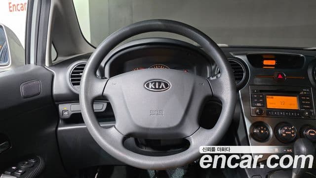 Kia 뉴카렌스 топовая версия Family, 2012 14