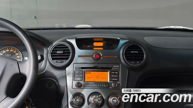 Kia 뉴카렌스 топовая версия Family, 2012 16