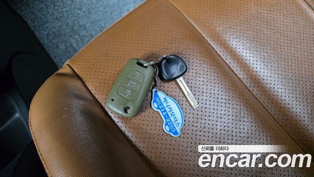 Kia 뉴카렌스 топовая версия Family, 2012 17