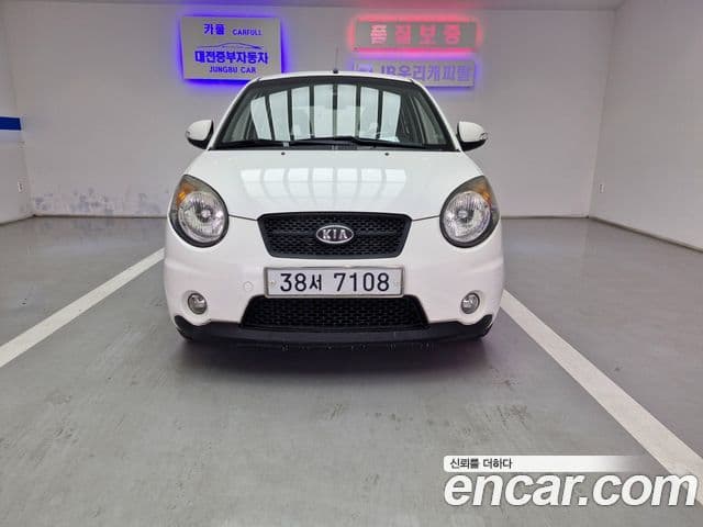 Kia 뉴모닝 люксовая версия Black Premium, 2009 1